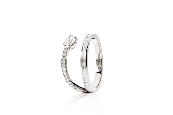 18ct gold White Diamond two row ring with central Oval Diamond.