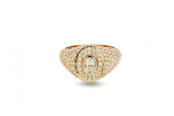18ct gold White Diamond pinky ring with Oval Diamond center and fully paved ring.