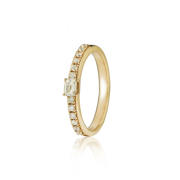18ct gold White Diamond ring with one central Emerald Cut Diamond