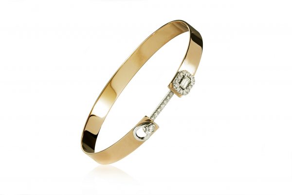 18ct gold White Diamond bangle with one Emerald Cut Diamond