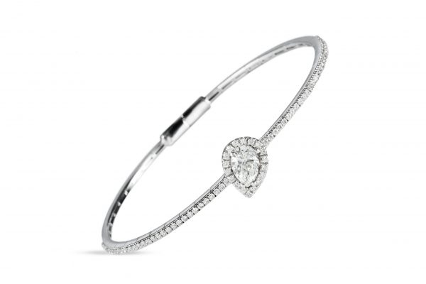 18ct gold White Diamond flexible core bangle with one central Pear Shaped Diamond