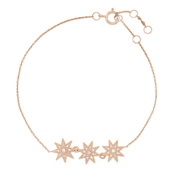 An 18ct gold bracelet, set with 0.12ct white diamonds. Stars measure 7mm each Bracelet length 18cm with three one inch jump rings for adjustable sizing in rose gold.