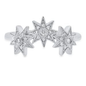 An 18ct gold ring, set with 0.12ct white diamonds. Stars measure 7 mm each Total of all three stars 21mm