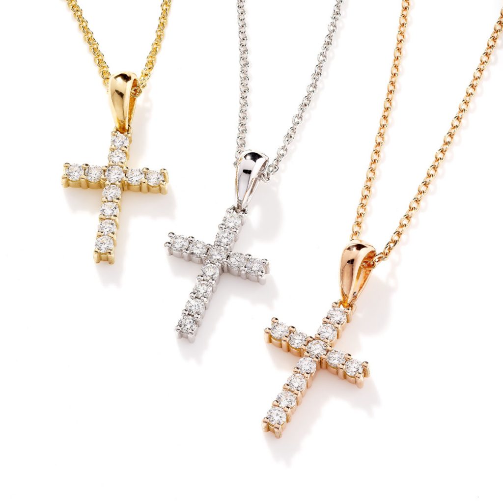 Small diamond cross pendants in 18ct rose yellow and white gold