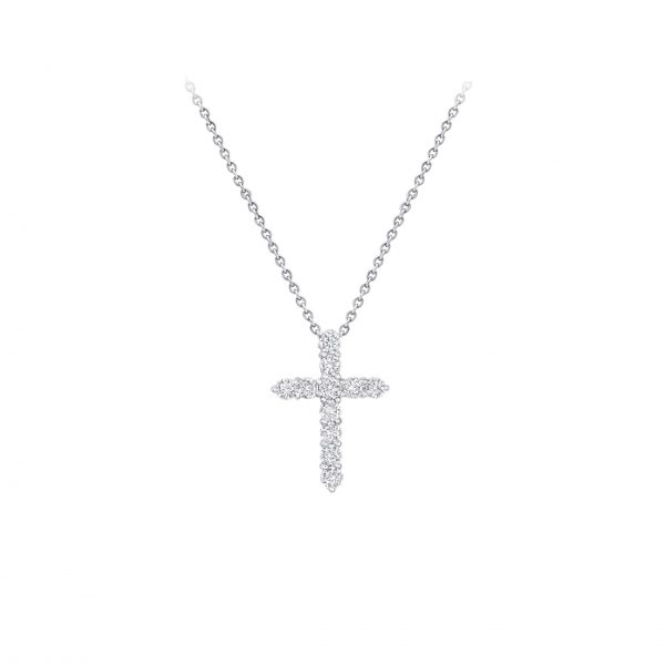 A classic motif, medium cross pendant in 18ct gold, set with 11 round brilliant cut diamonds with total weight of 0.94ct, suspended from an 18ct gold chain, each diamond is embraced by a minimal metal setting, optimising their brilliance and presence. Cross is approximately 22mm in length and 16mm in width.
