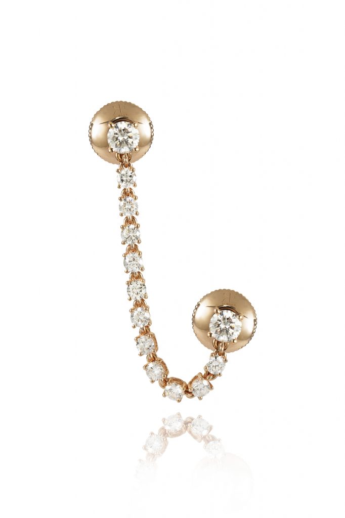 18ct gold Brilliant Cut White Diamond double piercing earring Approximate Diamond weight 0.85ct Length approximately 45mm. Please note that the earring requires two piercings