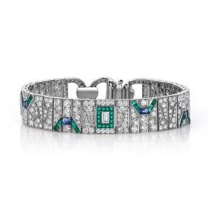 Art Deco style bracelet set with 5.92ct of white diamonds ( 0.38ct baguette cut and 5.54ct round brilliant cut diamonds), 2.70ct of emeralds and 1.05ct of sapphires, set in 18 carat white gold