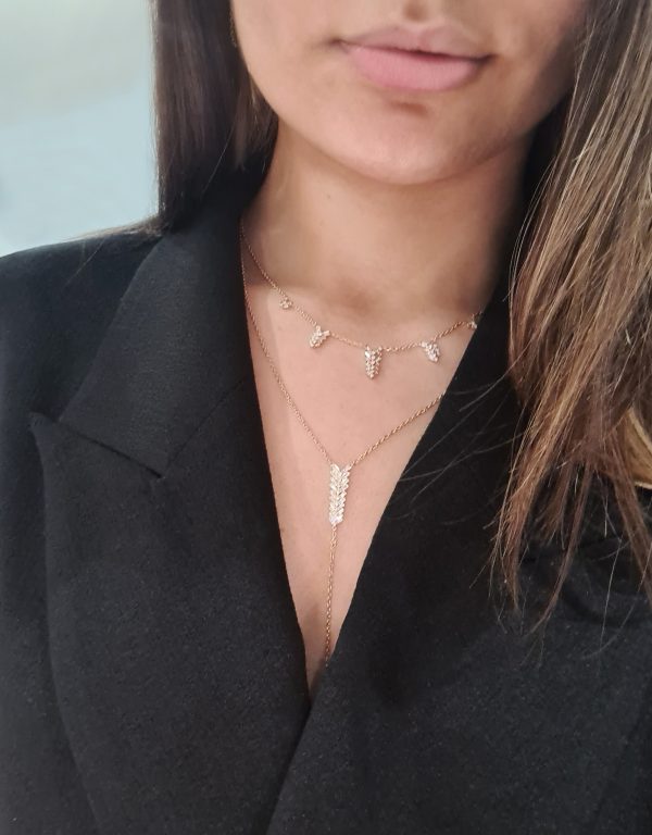 18ct gold White Diamond necklace set with baguette cut and round brilliant cut diamonds rose gold